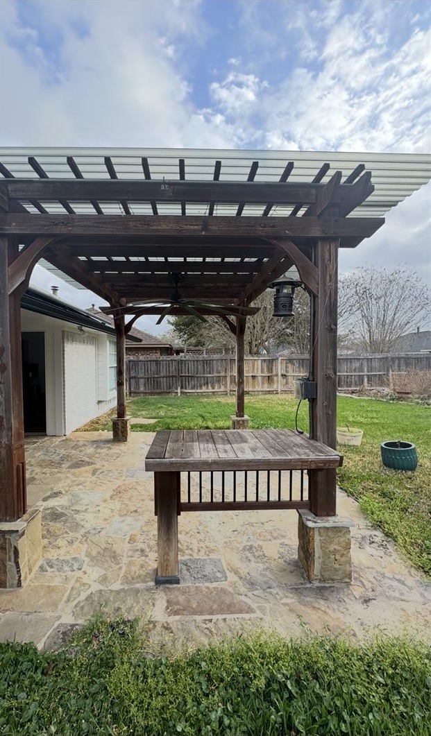 Backyard pergola before staining, weathered bare wood, fence and outdoor staining in the Brazos Valley, TX (College Station and Bryan)